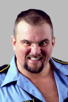 Ray Traylor como: Big Boss Man