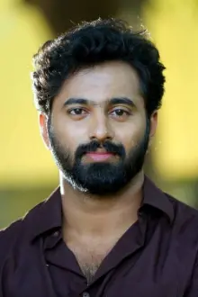 Unni Mukundan como: Ganesh Gangadharan