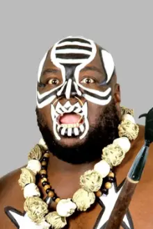 James Harris como: "The Ugandan Giant" Kamala