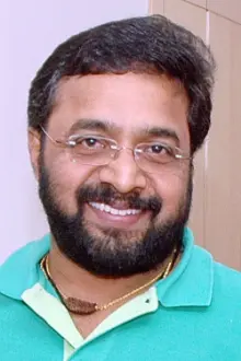 Renji Panicker como: Venugopal, Pournami's father