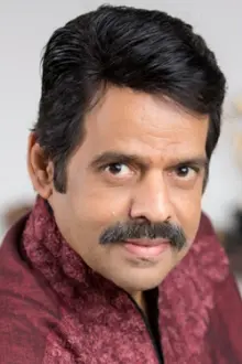 Balachandra Menon como: Lambodharan Nair