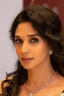 Nyla Usha como: Riny Titus