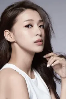 Jenna Wang como: Hu Xin Ya