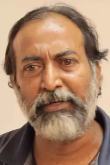 Amarendran Ramanan como: Janardhanan