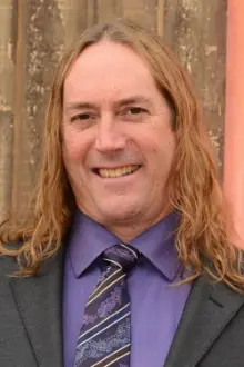 Danny Carey como: 