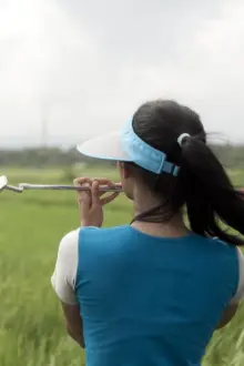 A Lady Caddy Who Never Saw a Hole in One