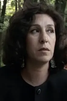 Hafsa Zinaï Koudil como: Madame Bellil