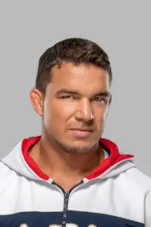 Chas Betts como: Chad Gable