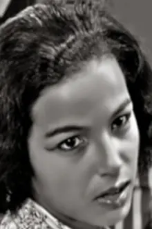 Michèle Bailly como: Amina