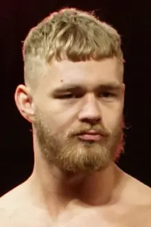 Tyler Bate como: Tyler Bate