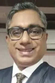 Ivan Rodrigues como: Dr. Kumodhi Banerjee