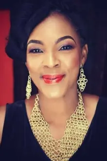 Tina Mba como: Mrs. Adeniji