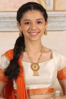 Gracy Goswami como: Amrit Sahani