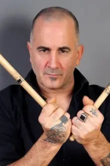 John Macaluso como: Drums