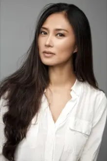 Xin Wang como: Amélie