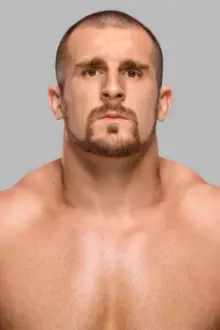 Dean Muhtadi como: Mojo Rawley