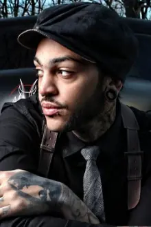 Travie McCoy como: 