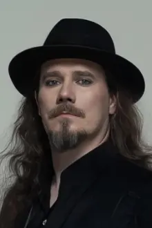 Tuomas Holopainen como: Tom Whitman (age 47)