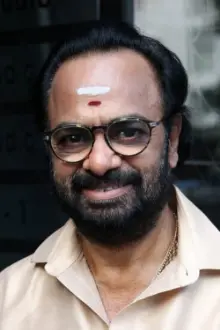 Poovilangu Mohan como: Schoolmaster Varadharajan / Kasi