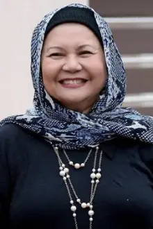 Raja Azmi como: Hajah Noriah