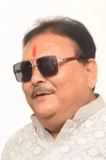 Madan Mitra como: Commisioner M. Mitra