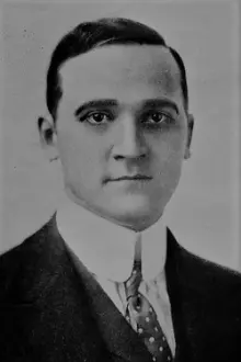 E.H. Calvert como: District Attorney John F. X. Markham