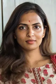 Niranjani Ashokan como: Pooja