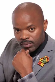 Dumisani Mbebe como: Dr. Mzwakhe Masilela