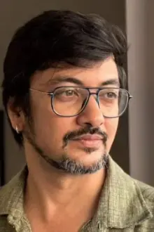 Shoumo Banerjee como: 