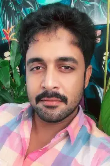 Manesh Krishnan como: Vivek