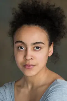 Harmony Rose Bremner como: Renee Okoye